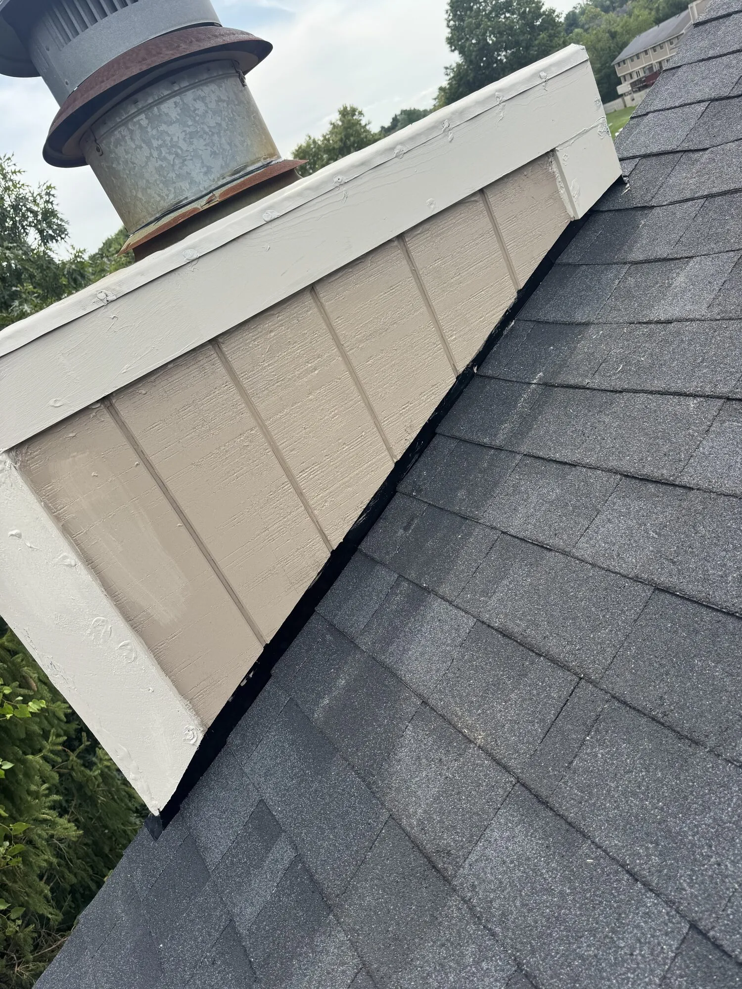 Chimney Reside & Trim. Soffit & Fascia project by West Penn Exteriors.